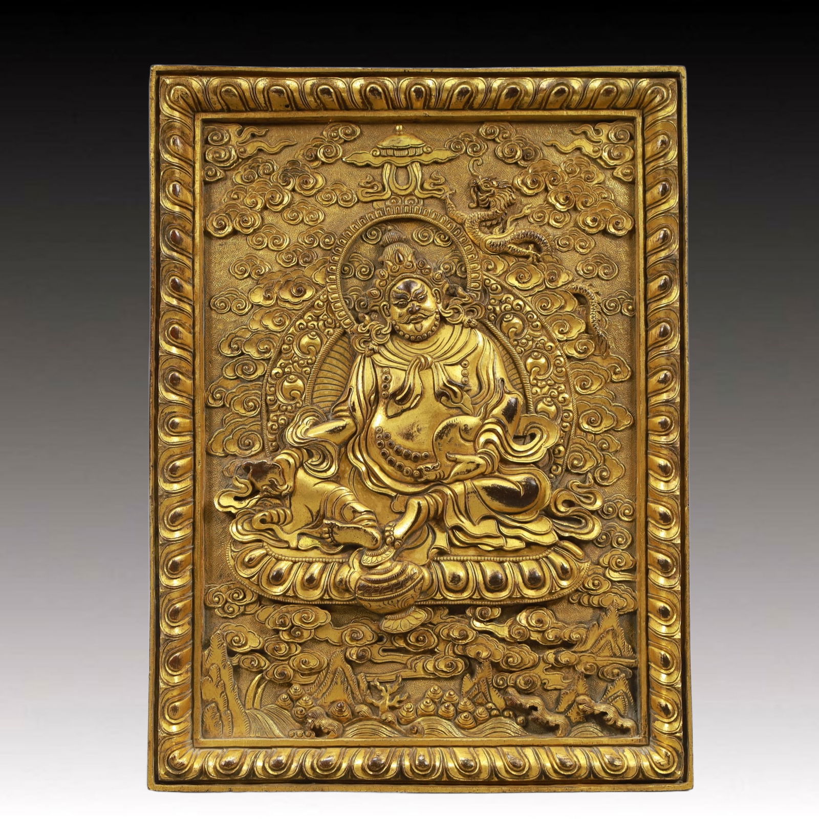 A Solemn Gilt Bronze Statue of Mammon: A Solemn Gilt Bronze Statue of Mammon,Ming Dynasty, China,Size:21.5cmx29.5cm Weight:3100g 铜鎏金财神像,中国明代