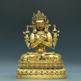 An Archaic Gilt-Bronze Figure Of Tara