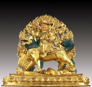 A Solemn Gilt Bronze Statue of Mammon Rides the Lion