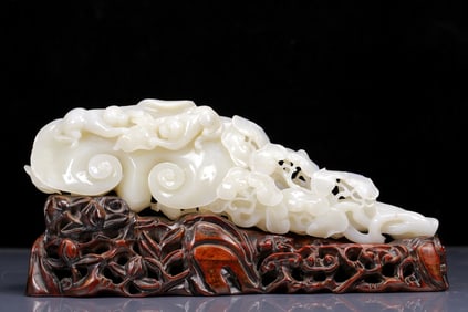 A Rare White Jade Figure and Ganoderma lucidum Pattern Ruyi