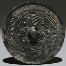 An Archaic Bronze Auspicious Beast Pattern Round Mirror