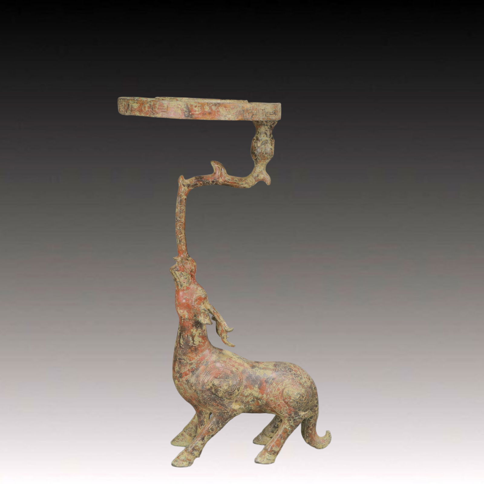 A Rare Bronze Sika Deer Candlestick: A Rare Bronze Sika Deer Candlestick,Ancient Time, China,Size:26cmx21.2cmx50cm,Weight:3600g 青铜梅花鹿烛台,中国远古时期