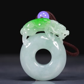 A Precious Natural Jadeite Chi-Dragon Pendant