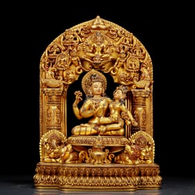 A huge gilt bronze statue of the four-armed Chakrasamvara inlaid with hundreds of treasures, with in