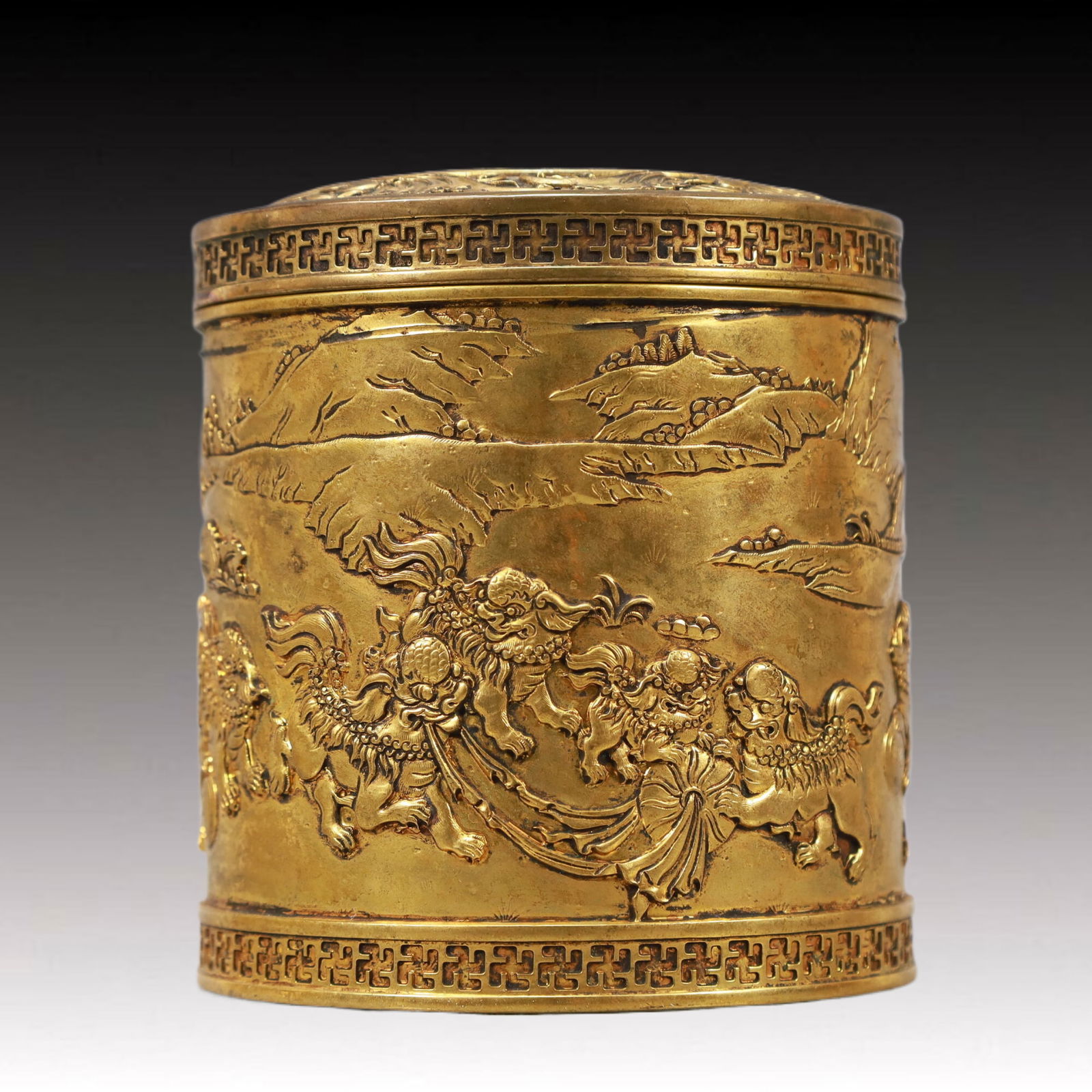 A Rare Gilt Bronze Lion Pattern Cover Jar: A Rare Gilt Bronze Lion Pattern Cover Jar,Qing Dynasty, China,Qianlong Four-character Mark,Size:11cmx11.5cm,Weight:1100g 铜鎏金狮子纹盖罐,中ࢲ