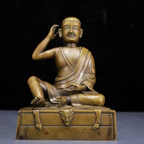 A Solemn Bronze Statue of Guru