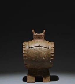 An Archaic Bronze Cloud Pattern Four Legs Ornament