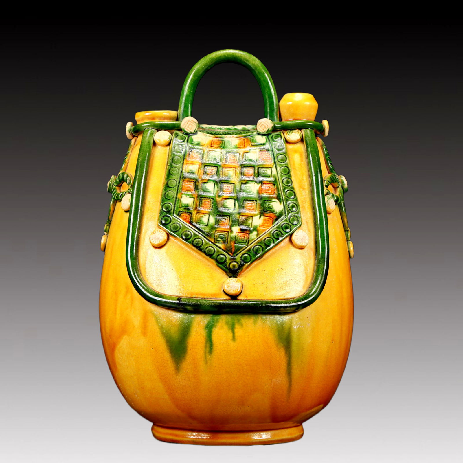 A Rare Tang Tri-Color Glazed Pottery Ewer: A Rare Tang Tri-Color Glazed Pottery Ewer,Tang Dynasty, China,Chinese Tang Tri-colored Pottery, or Tang Sancai, flourished during the Tang Dynasty (618–907 AD). It's renowned for its vibrant amb