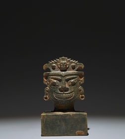 An Archaic Bronze Human-face Pattern Ornament