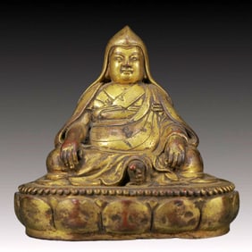 A Solemn Gilt Bronze Statue of Guru