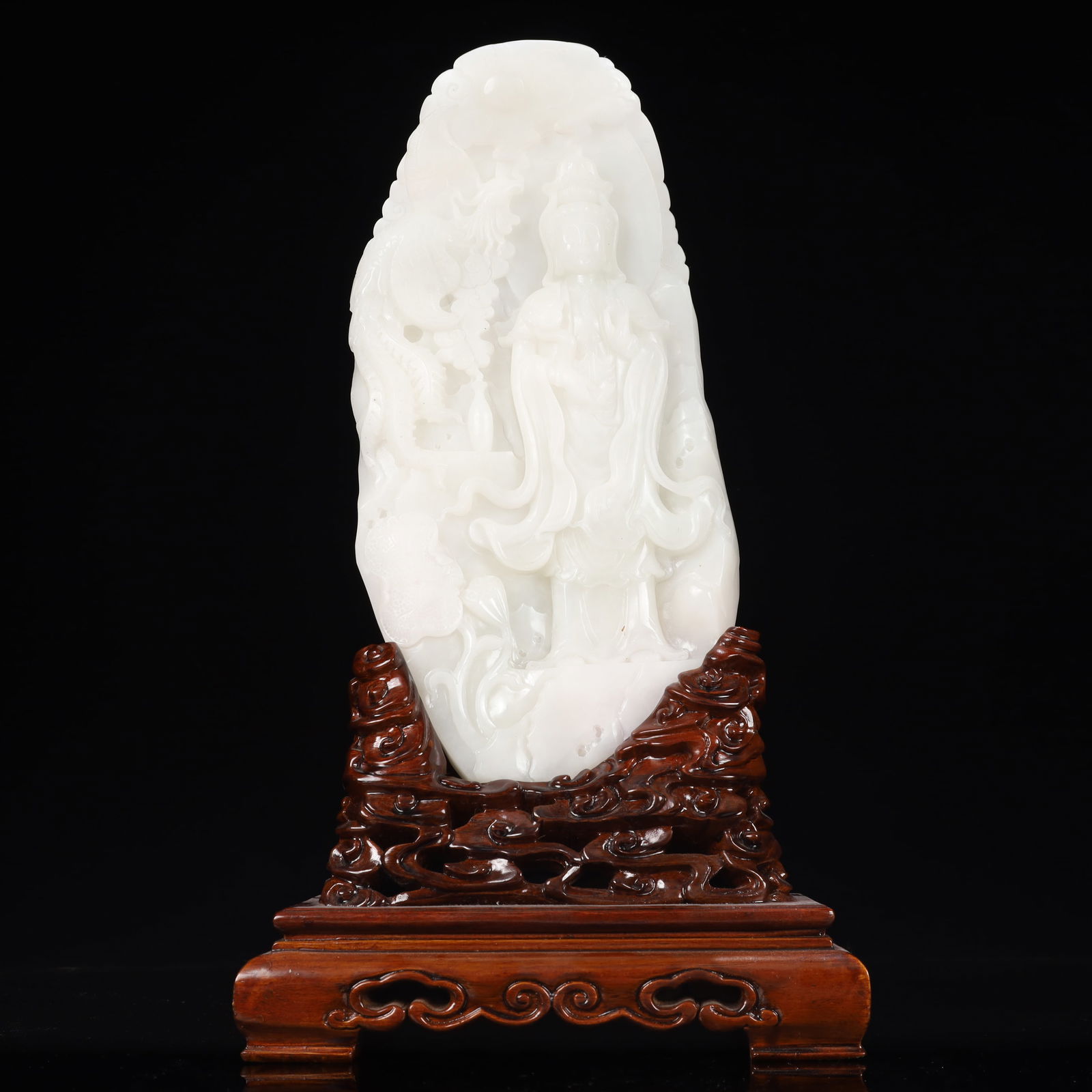 A Rare White Jade Auspicious Cloud and Avalokitesvara Pattern Ornament,With Base: A Rare White Jade Auspicious Cloud and Avalokitesvara Pattern Ornament,With Base,Qing Dynasty, China,Size:15cmx2.5cmx30.5cm,Weight:2150g 白玉祥云观音像纹
