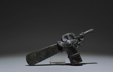 An Archaic Bronze Beast-head Weapon