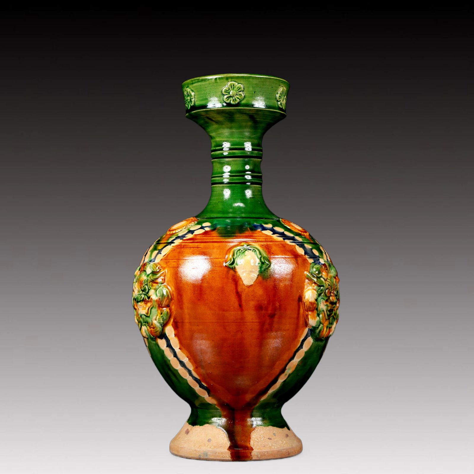 A Rare Tang Tri-Color Glazed Pottery Lion Pattern Vase: A Rare Tang Tri-Color Glazed Pottery Lion Pattern Vase,Tang Dynasty, China,Chinese Tang Tri-colored Pottery, or Tang Sancai, flourished during the Tang Dynasty (618–907 AD). It's renowned for its vi