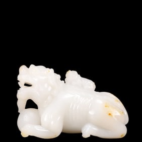 An Exquisite White Jade Auspicious Beast Ornament