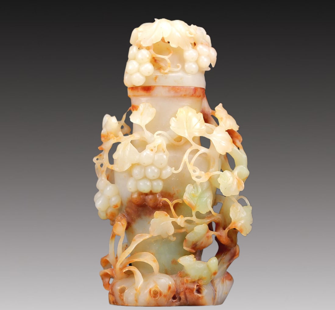 A Magnificent White Jade 'Squirrel& Grape' Vase And Cover: A Magnificent White Jade 'Squirrel& Grape' Vase And Cover. The stone of a white tone with russet inclusions. Early Chinese Qing Dynasty. Size:11cmx5.5cmx21.5cm ??? ????????????