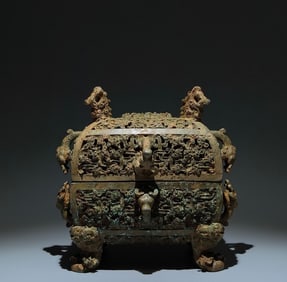 An Archaic Bronze Hollow Chi-Dragon Pattern Four Legs Food Vessel