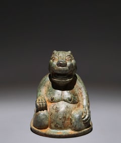 An Archaic Bronze Bear Ornament