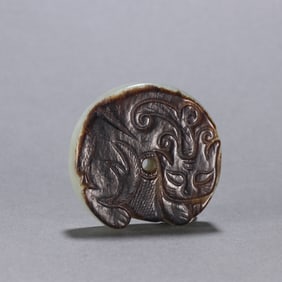 A Rare Hotan Jade Auspicious Beast Pendant