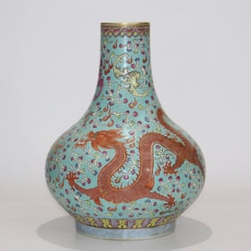 A Exquisite Turquoise-Glazed Green Ground Famille-Rose Dragon and Phoenix Pattern Vase