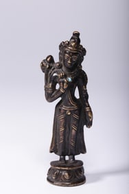 A Rare Bronze Statue of Avalokitesvara Holding Lotus