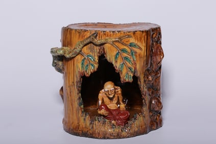 A Rare Imitation Animal Porcelain Carving Arhat Meditating in Tree Hole Ornament
