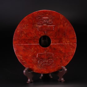 An Archaic Red Jade Bi