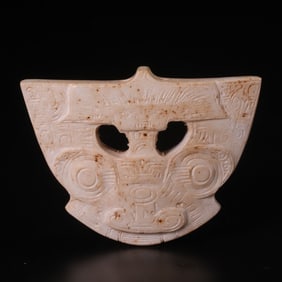 An Archaic Gaogu Jade Crown-Shaped Implement