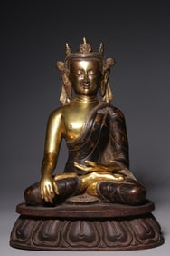 A Rare Gilt Bronze Silver-Inlaid Statue of Vairocana Buddha Seated