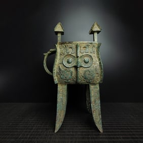 An Exquisite Bronze Beast-Face Pattern With Inscription Cup