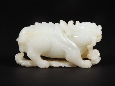 An Exquisite White Jade Auspicious Beast Ornament