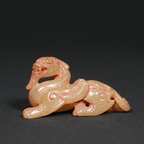 An Exquisite White Jade Auspicious Beast Pendant