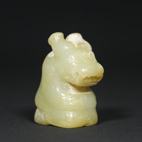 An Exquisite White Jade Bear Pendant