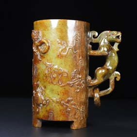 An Exquisite White Jade Auspicious Beast Pattern Cup