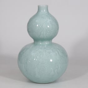 An Exquisite Celadon Glazed Flower and Fruit Pattern Gourd-Shaped Vase