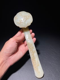 An Exquisite White Jade Flower and Bird Pattern Ruyi Ornament