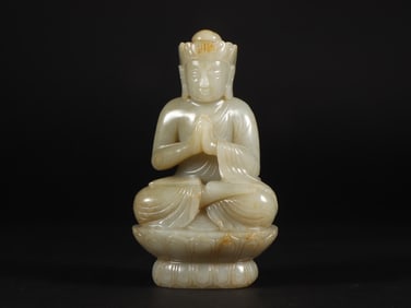 An Exquisite White Jade Buddha Statue