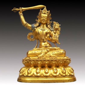 A Solemn Gilt Bronze Buddha Statue