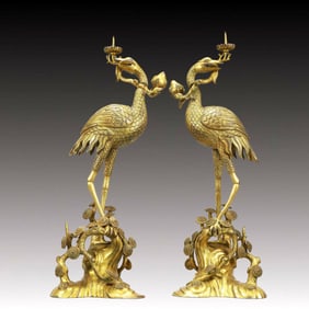 A Pair of Rare Gilt Bronze Crane Candlesticks