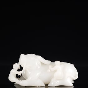 An Exquisite White Jade Figure Pattern Buffalo Ornament