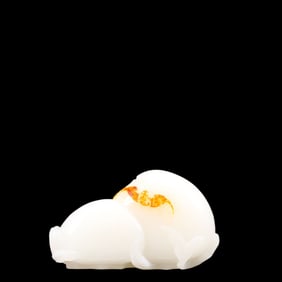 An Exquisite White Jade Peach Ornament