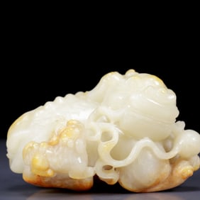 An Exquisite White Jade Auspicious Beast Ornament