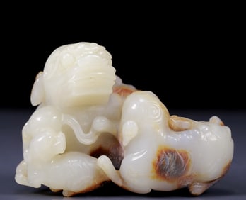 An Exquisite White Jade Auspicious Beast Ornament