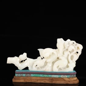 A Rare White Jade Flower and Bird Ornament