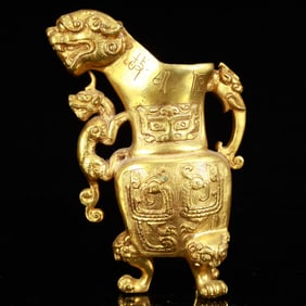 A Rare Gilt Bronze Lion Tripod Cup