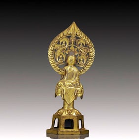A Solemn Gilt Bronze Buddha