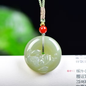 An Exquisite Greenish Jade Lotus Pattern Pendant
