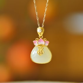 An Exquisite Sterling Silver-Gold Plated Inlaid White Jade Pendant