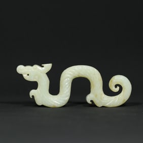An Exquisite White Jade Dragon Pendant