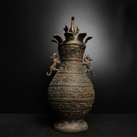 An Exquisite Bronze Double-Ears and Tripod Vase