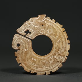 An Exquisite White Jade Dragon Pendant